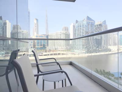 3 Bedroom Hotel Apartment for Rent in Business Bay, Dubai - Full Burj Khalifa and Canal View | Serviced Hotel Apartments