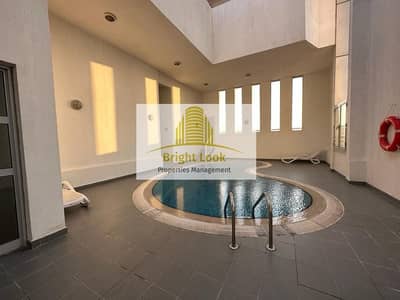 4 Bedroom Apartment for Rent in Airport Street, Abu Dhabi - Delightful 4BHK apartment with Maid's room, gym, pool  & Parking in 105,000/Year | 4 Payments
