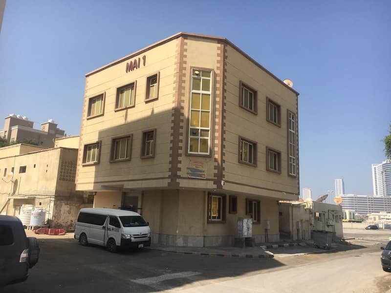 For sale a residential investment building in Al-Liwara - Ajman