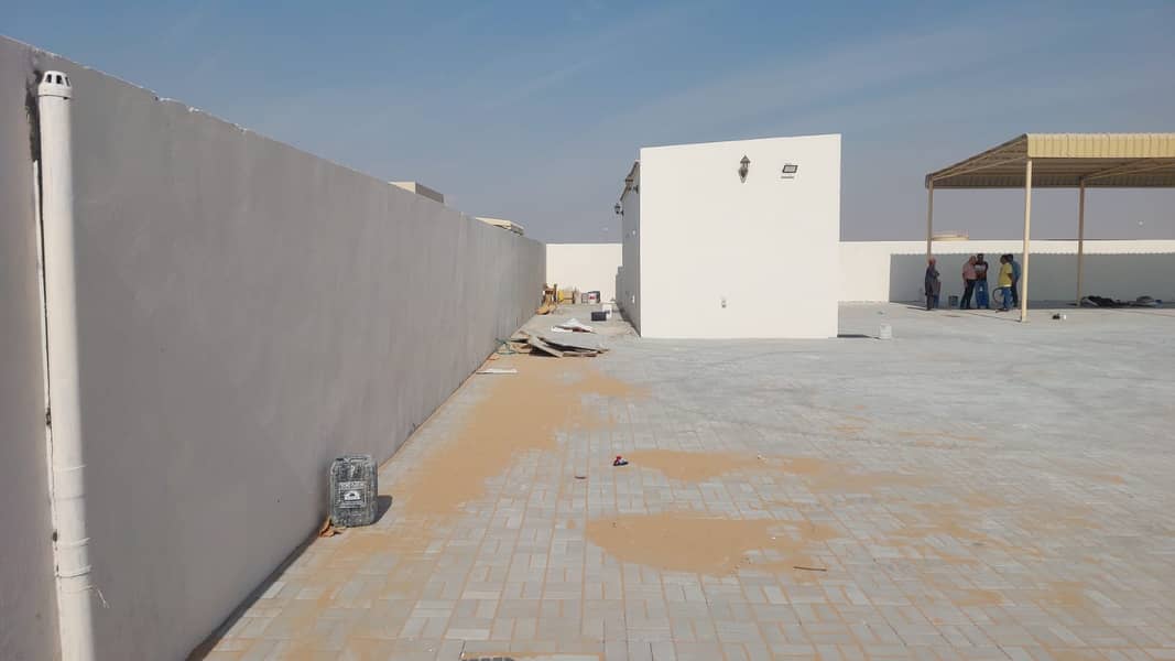 Brand New Open plot of 10,000 sq. ft. with shed AED. 100,000/-