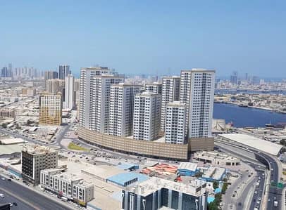 1 Bedroom Apartment for Sale in Ajman Downtown, Ajman - Greek view and open view 1 BHK with Parking Available for Sale in Ajman Pearl Tower