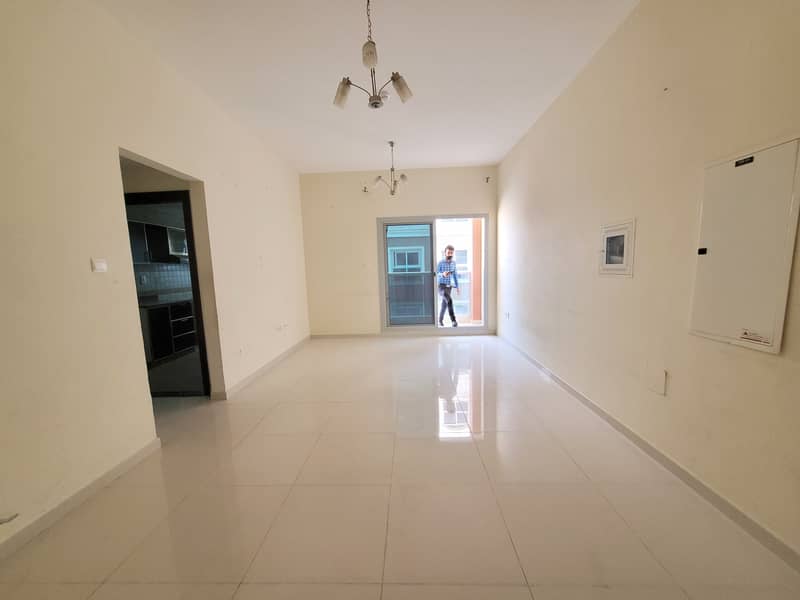2bhk just 50k in 4 chqs with gym pool covered parking  on prime location in al warqaa