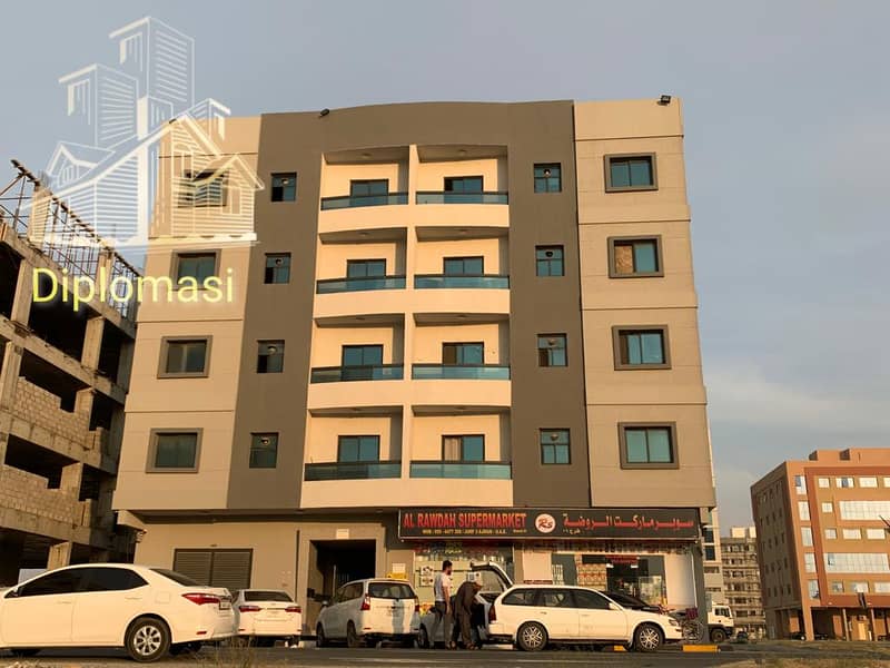 A building for sale with an income of 10 percent in the Emirate of Ajman, Al Jarf area, and fully rented