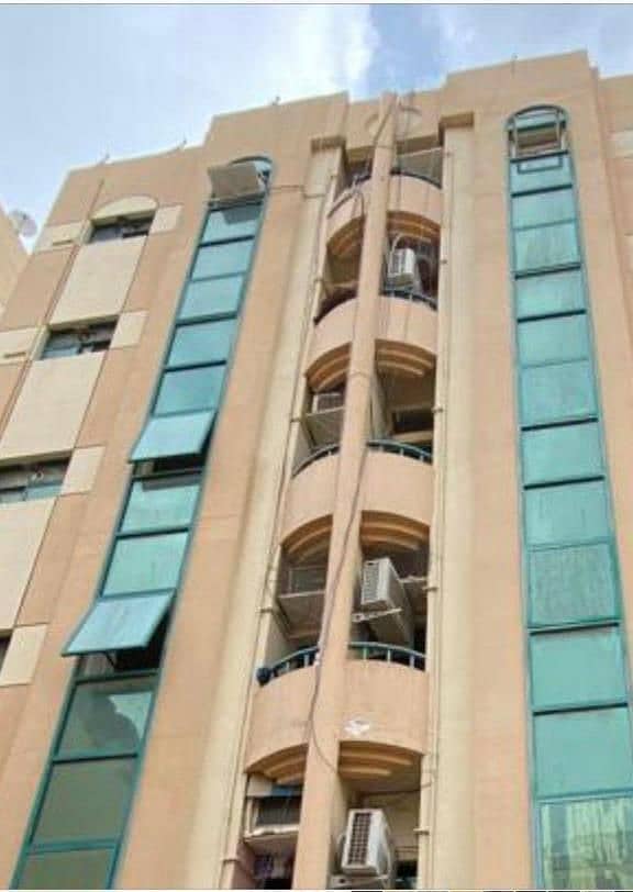 For sale Al Butinah area building in Sharjah  with an annual income 270000 dirhams