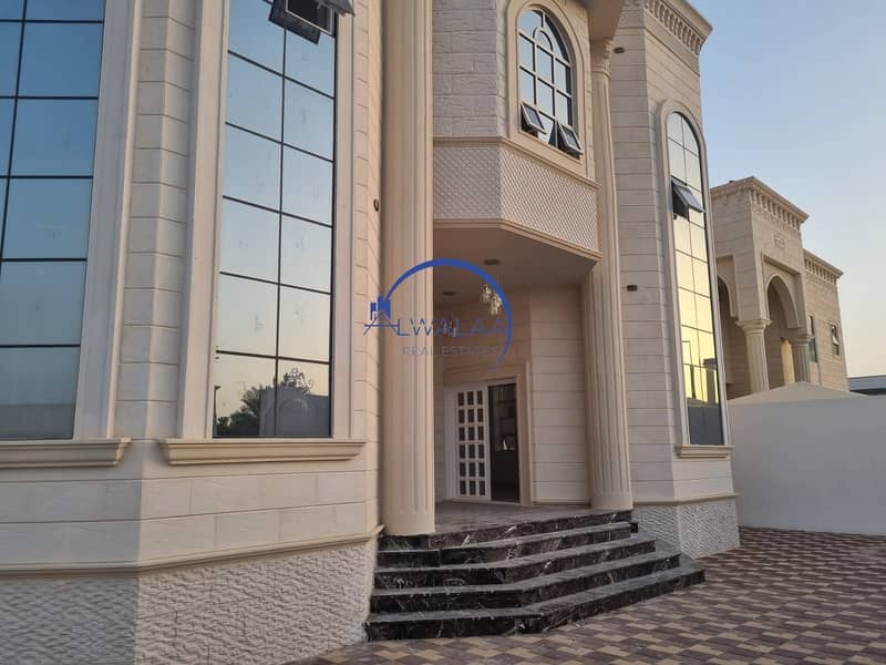 For sale a beautiful villa on a corner in Al Ain Al Bateen