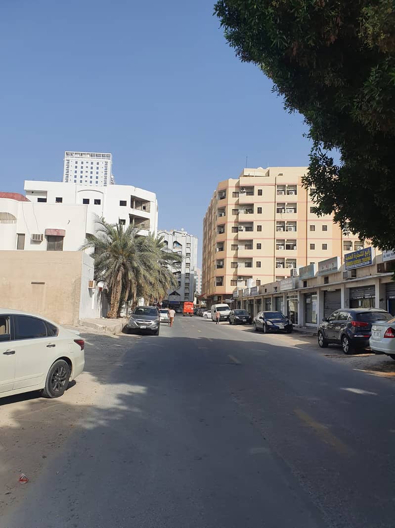 Commercial land for sale * Excellent and vital location minutes from Ajman Corniche *