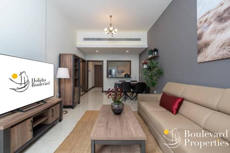 1 Bedroom Flat for Rent in Jumeirah Village Circle (JVC), Dubai - Elevated Living | Large 1BR Apartment with Terrace and High-End Furnishings