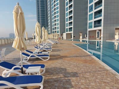 2 Bedroom Flat for Sale in Corniche Ajman, Ajman - FULL SEA VIEW STYLISH TWO BEDROOM PLUS HALL WITH FREE CHILLER AC AND ONE CAR PARKING 1650 SQFT FOR SALE IN AJMAN CORNICHE RESIDENCE ONLY 749000 CASH