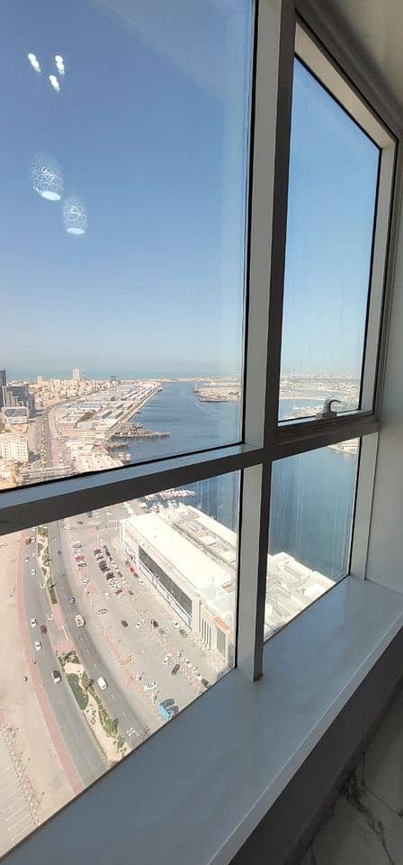 Two rooms and a hall in Oasis Towers, free air conditioning, full sea view