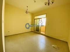 Nice 1BR behind Souq Extra