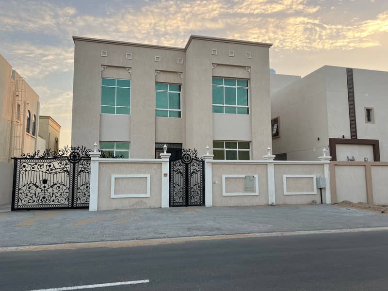 For rent, Villa Al Helio, Ajman, two floors, 4rooms, two halls, and a new