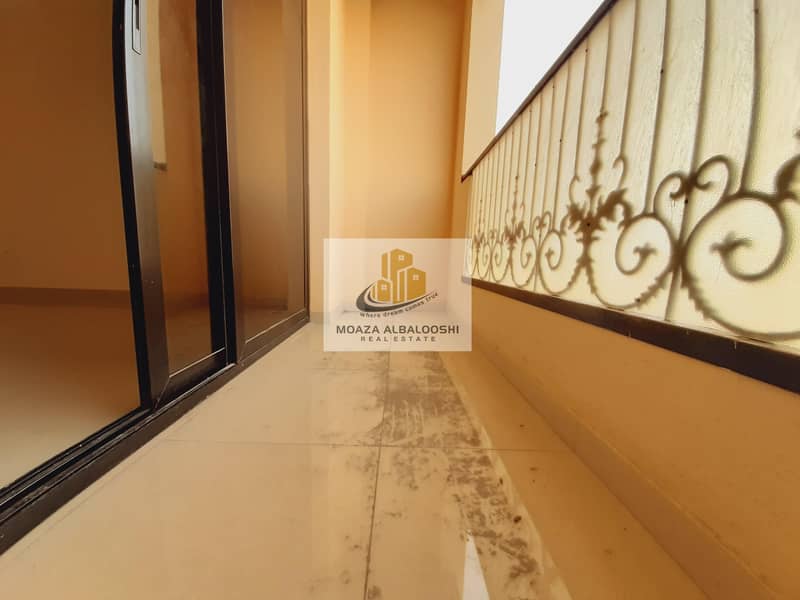 LIKE NEW APARTMENT IN MUWAILEH COMMERCIAL WITH BALCONY  EASY EXIT TO DUBAI