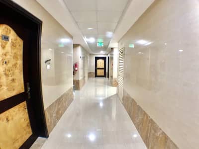 1 Bedroom Flat for Rent in Industrial Area, Sharjah - 1 B/R HALL FLAT WITH SPLIT DUCTED A/C AVAILABLE  IN INDUSTRIAL AREA NO. 2 NEAR TO MAZA SIGNAL