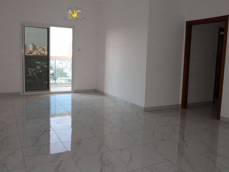 Apartment for annual rent in Ajman, two rooms and a hall, the first inhabitant in a new tower in Al Nuaimiya