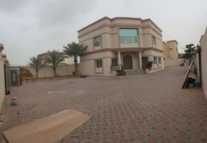 5 b/r spacious independent villa + 2 living rooms + large landscaped garden for sale in Al Quoz 2
