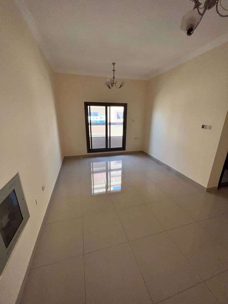 Apartment one room and hall for annual rent in Al Rawda, 2 bathrooms, a wall closet and a balcony