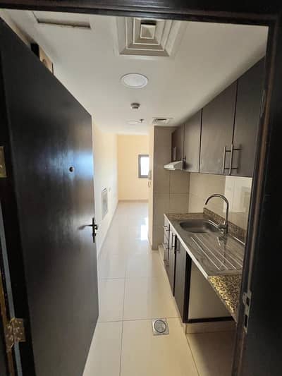 For rent in Ajman, annual studios in Al-Rawda area, in front of a hypermarket treasure, excellent area. Various models are available with balcony and