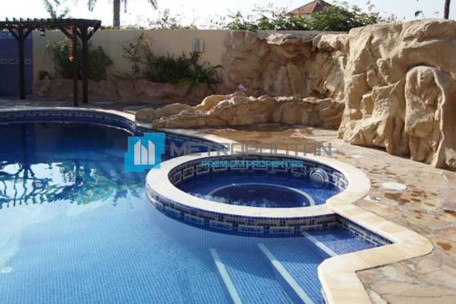 Resort Style Landscaping of Pool with Waterfall