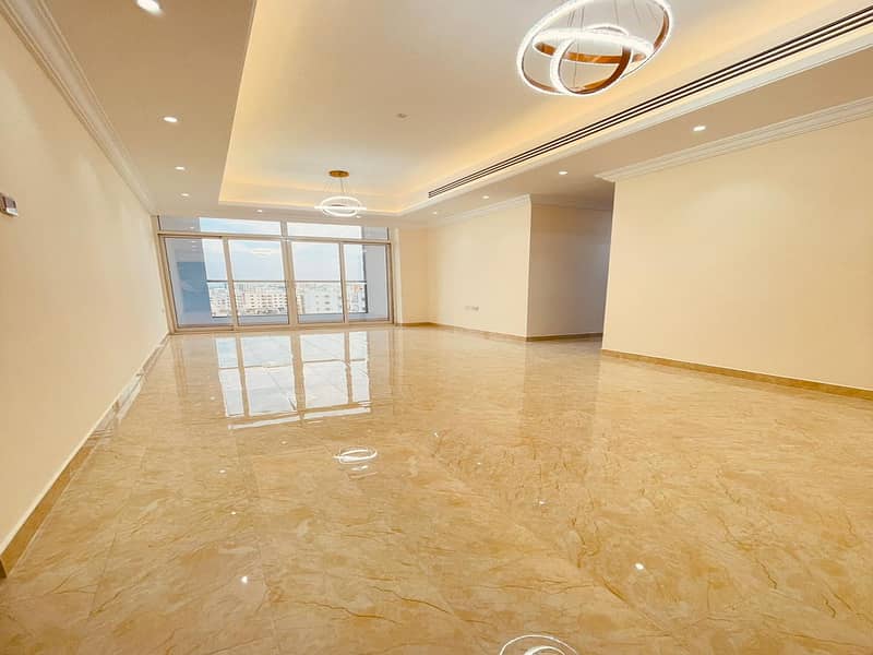 Apartment three rooms and a hall, the first inhabitant in Al Rawda 2, for annual rent, with a private parking and two months free - master room