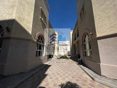 For rent in Khalifa City, a villa with 6 rooms, a majlis, a hall, a maid’s room, deluxe finishing, safes in the wall