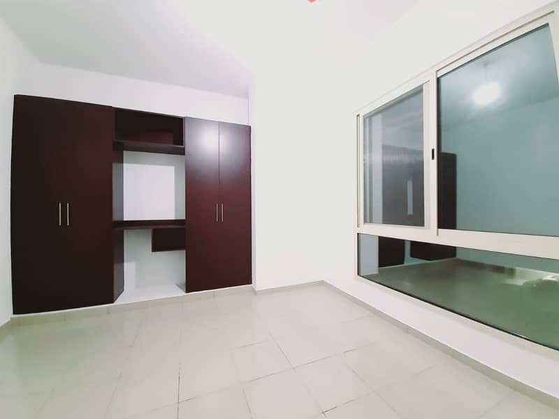 OPPOSIT TO  NMC   900 SQF CHILLER FREE   LUXURIOUS  1 BHK   WITH 2 BATH BALCONY  GYM POOL PARKING