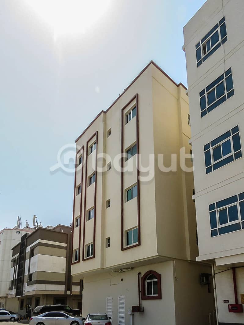 A building for sale in Al Bustan area