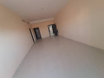 For rent in Ajman, a new building has opened, two rooms, a hall, and an annual hall room, in Al Jurf 3, next to the Woodlem Park School, and close to