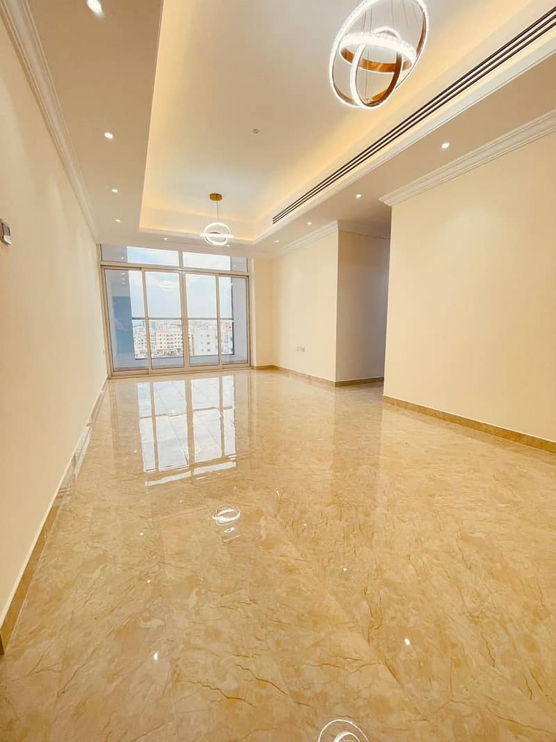 2 rooms and a hall for annual rent in Ajman, Al Rawda 2, opposite Kenz Mall, super deluxe finishing