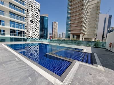 1 Bedroom Apartment for Rent in Business Bay, Dubai - 1-Br Apartment | Canal View |  Huge Balcony | Low Rent | Business Bay