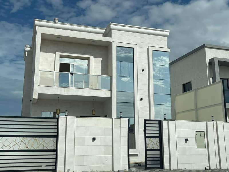 For sale, a villa in the best residential locations in Al-Zahia area, on Sheikh Mohammed bin Zayed Street, directly, VIP finishing, large building are
