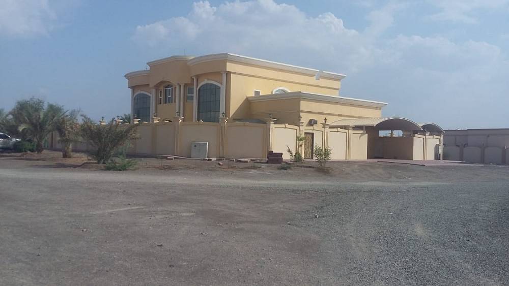 land in ajman without fees only pay120000