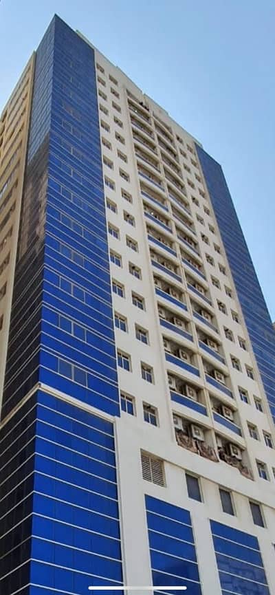 Bulk Unit for Sale in Al Nuaimiya, Ajman - Tower for sale ground floor + 4 parks + 15 floors residential commercial