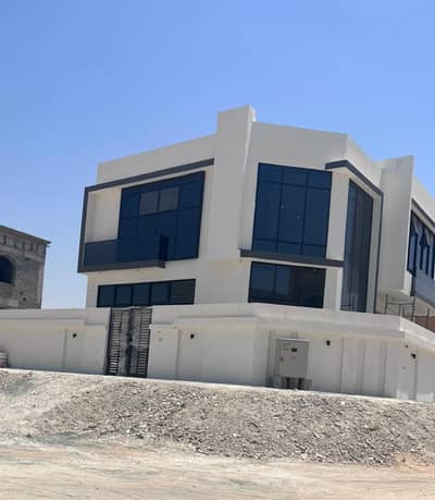 5 Bedroom Villa for Rent in Al Helio, Ajman - Villa for rent, first inhabitant, super deluxe finishes, excellent location, on two streets, at a great price