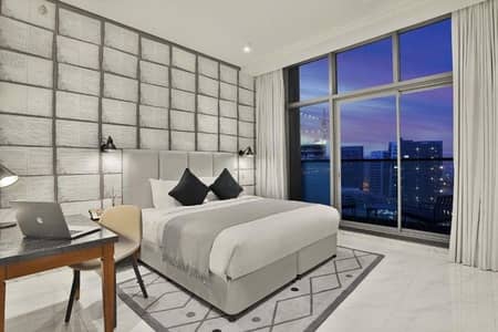 شقة 2 غرفة نوم للايجار في الخليج التجاري، دبي - شقة فاخرة بغرفتي نوم في الخليج التجاري تشمل جميع الفواتير وخدمة الواي فاي ومواقف السيارات والتنظيف