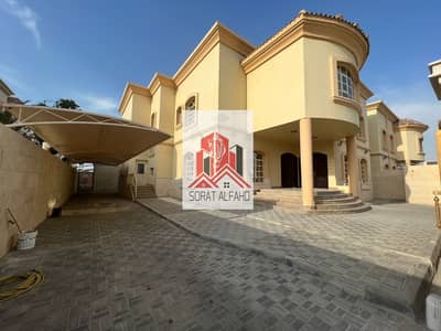 Villa with a private entrance in Khalifa City A, 6 rooms, with a council, 8 bathrooms, KCA