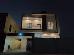 Villa for sale, Ajman, Al Yasmeen area, two floors, a stone facade on a direct neighbor street, with the possibility of easy bank financing