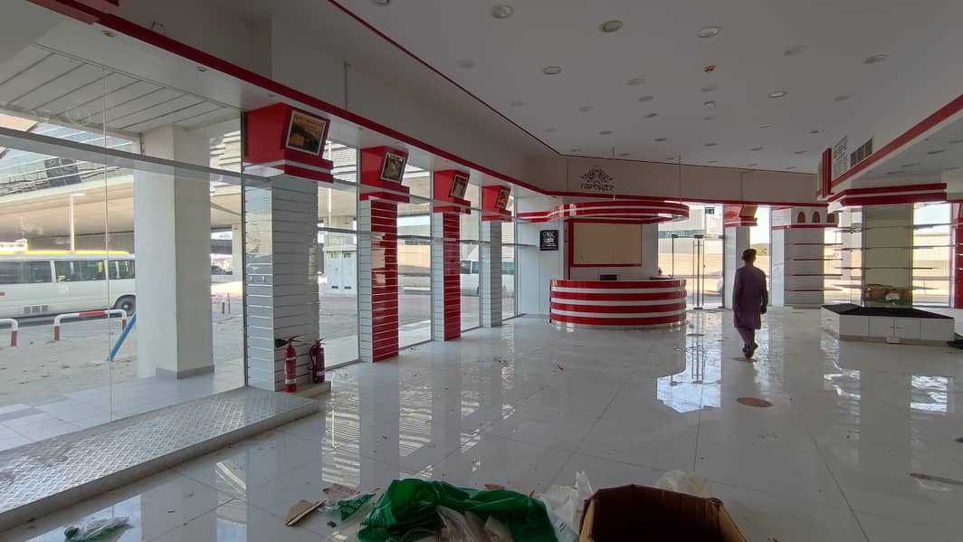 Near Metro, Chiller Free "Spacious showroom available for rent on a prime location, perfect for showcasing your business. "
