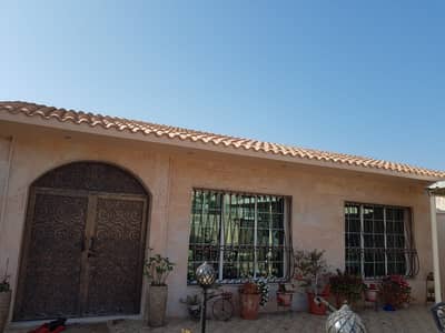 For sale, a villa in Mansoura, near the garden, the mosque, and the main street
