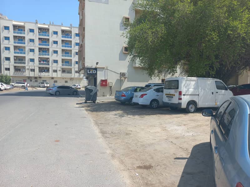 Residential commercial land, corner of a street and a road in Al Rashidiya 2