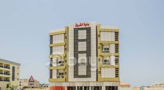 2 Bedroom Flat for Rent in Al Rass, Umm Al Quwain - Flat 2 Bedrooms Hall For Rent Near Lulu Center - Residential Family
