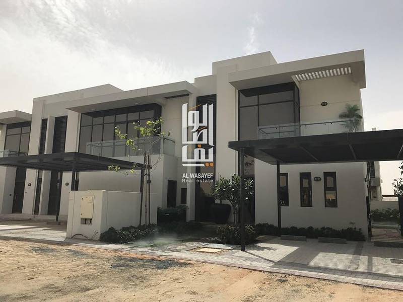 Own a luxury villa without maintenance fees in Dubai Land..