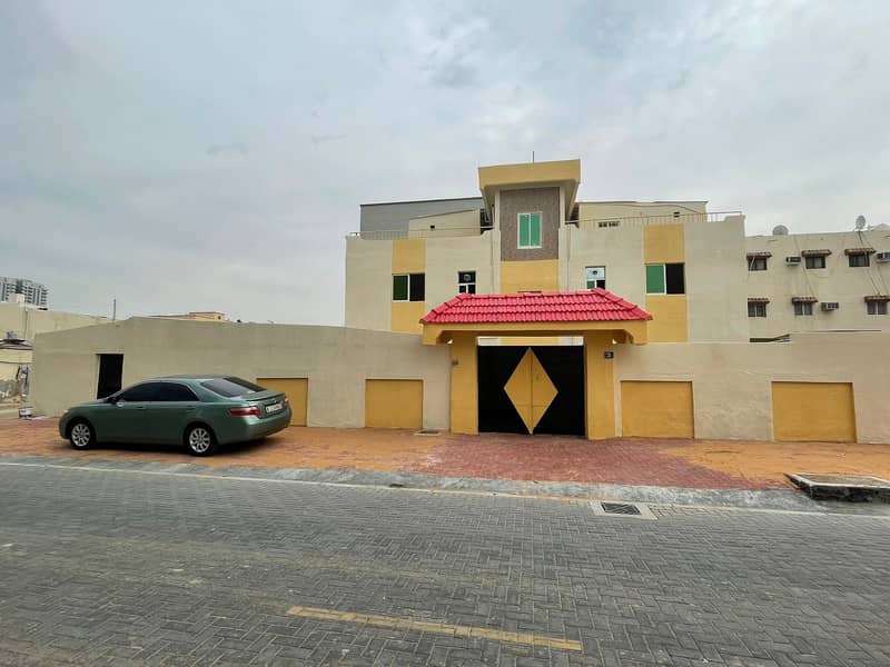 For sale in Ajman, Al Nuaimiya, a residential building An area of ​​6400 feet of 7 apartments