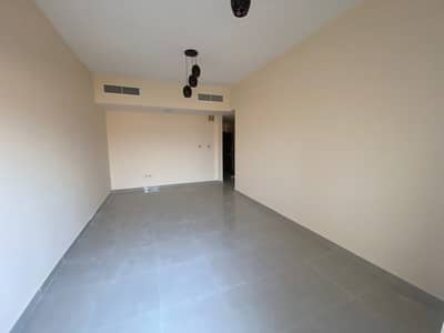 For rent in Ajman, a new building, the first inhabitant, a room, hall and studios + one month free + parking close to Woodlim Park School