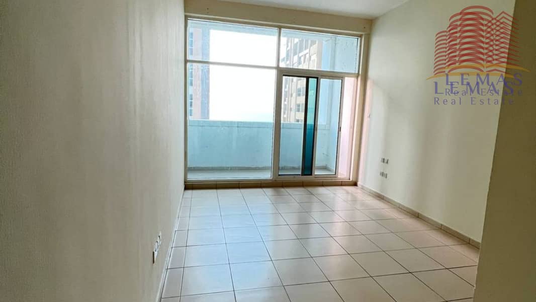 Amazing 2 bhk partial sea view open kitchen | Empty and with parking for sale in Ajman one tower