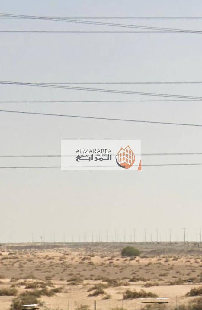 For sale a commercial land corner  in suburb of Al-Rawidat Azeeb in Sharjah  Near Tilal Project