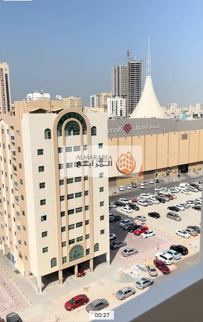Apartment for sale in Afamia Tower 2, Al Qassimia / Sharjah, directly opposite Mega Mall