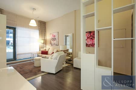 فلیٹ 1 غرفة نوم للايجار في الصفوح، دبي - Living Area