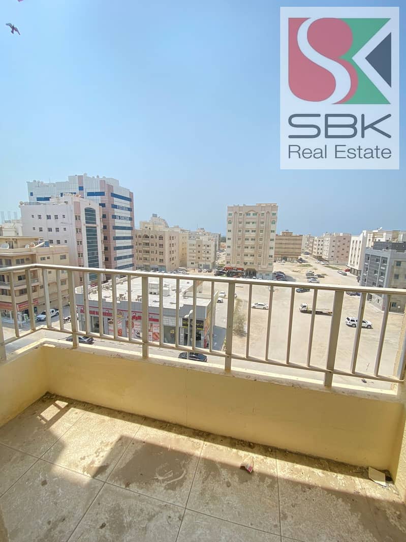 SPACIOUS 2 BHK APARTMENT WITH BALCONY (OPEN VIEW) IN OROBA BUILDING, BUTINA, SHARJAH
