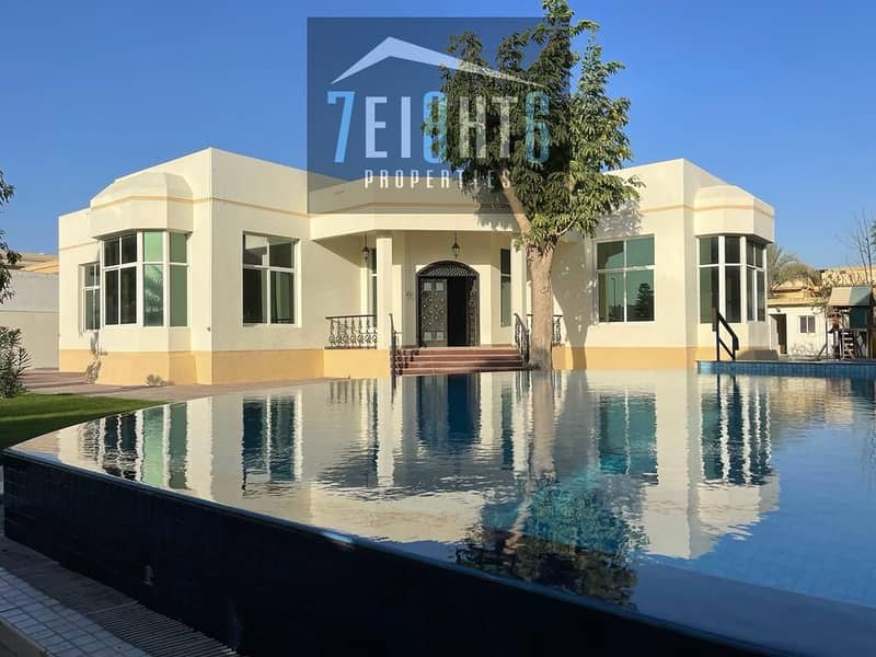 Outstanding villa : 4 b/r high quality  villa + maids room + s/pool + landscaped beautiful  garden for rent in  Mizhar