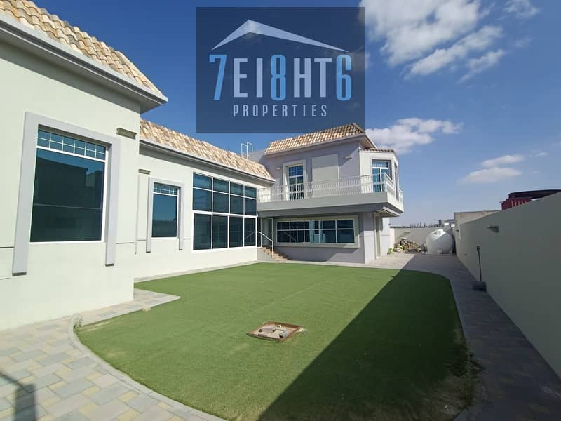 Beautifully presented: 7 b/r good quality independent villa + maids room + large landscaped garden for rent in Warqaa 3